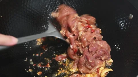 Wok Fried Shredded Pork with Fermented Bean Paste and Chili Stock Footage 346488406