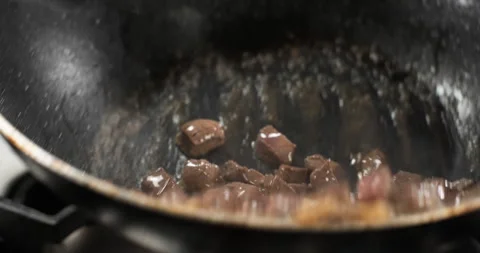 Wok pan with frying meat. Chef tossing throwing meat in the air. meat. Meat Stock Footage 292768837