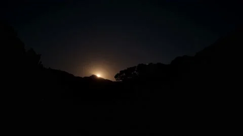 Wolf Moon 2022 Rising From Behind The Mountains Stock Footage 169225424