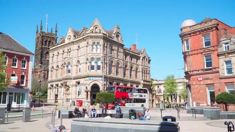 Wolverhampton. People walk and relax on a sunny day Stock Footage 152887997