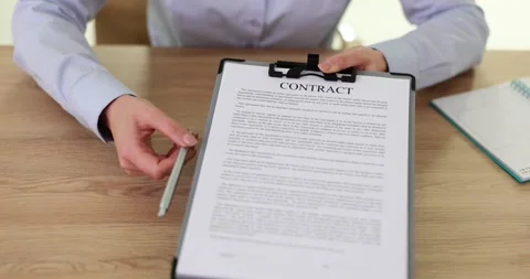 Woman agent offers to sign contract at workplace Video stock 271223053