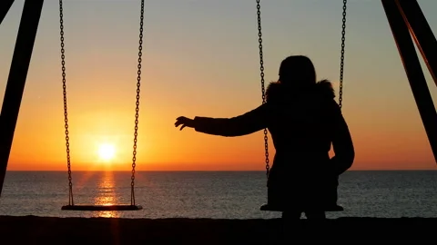 Woman alone missing her lost partner at sunset Video stock 103309210