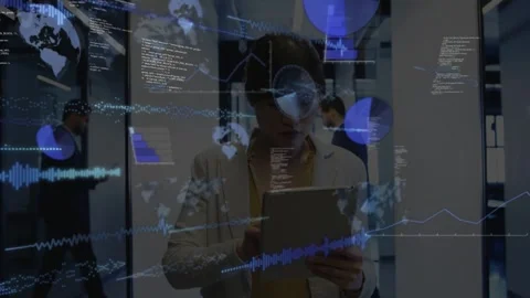 Woman analyst tapping tablet in corridor, generating animated maps, charts, code Stock Footage 333078169