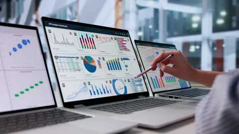 Woman Analyzing Finance Data On Computer Dashboard Stock Footage 332909123