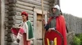 Woman and knight in armours in Kyivan Rus park, Kopachiv village, Ukraine HD Footage