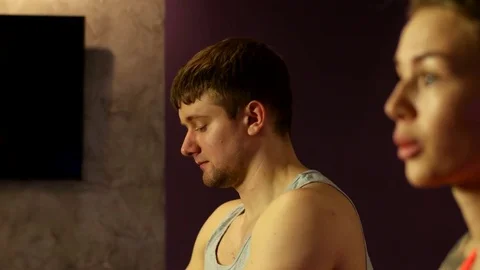 Woman and Man do on Exercise Bike. Stock Footage 75364651