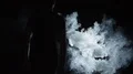 The woman and man walking in a dark through the smoke cloud. slow motion 4k or 4k+ Resolution