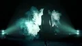 The woman and man walking in a dark through the smoke cloud. slow motion 4k or 4k+ Resolution
