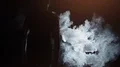 The woman and man walking through the smoke. slow motion 4k or 4k+ Resolution
