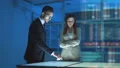 The woman and a man working with a virtual display 4k or 4k+ Resolution
