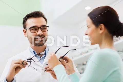 Woman and optician showing glasses at optics store ~ Premium Photo ...