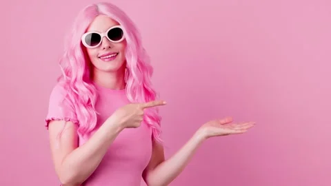 Woman and pointing at mockup workspace for advert, marketing, promotion or text. 動画素材 245840853