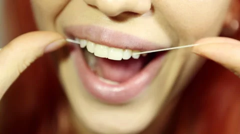 Woman and teeth floss Stock Footage 59643478