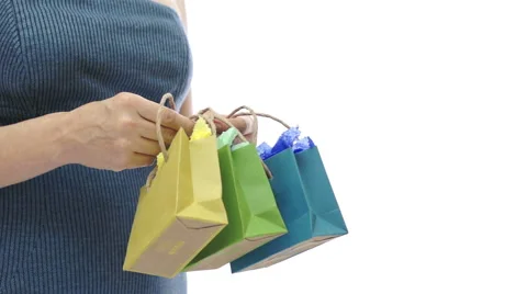 Woman and Three Small Colored Gift Bags Stock Footage 42878053