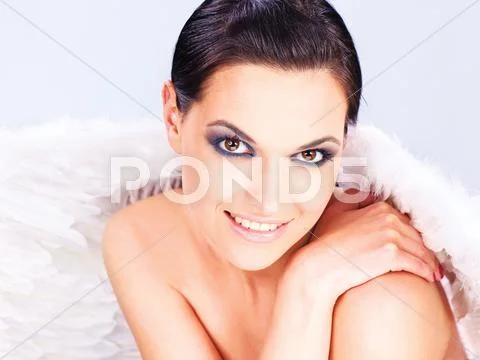 Woman with angel's wings Stock Photos