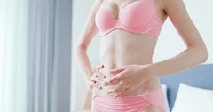 Beautiful young asian woman in underwear looking mirror applying cream and  lotion on belly., Lifestyle Stock Footage ft. lotion & body - Envato  Elements