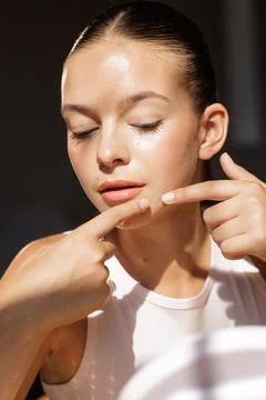 Woman Applying Acne Patch for Face Spot Treatment Skincare Stock Photos