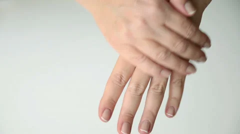 Woman applying hand lotion Stock Footage