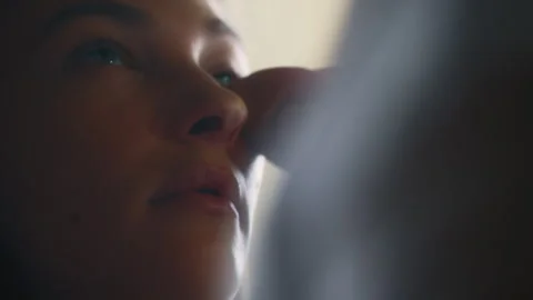 Woman applying makeup on a model Stock Footage 275332297