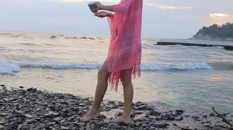 Woman applying suntan cream. Close up view on the legs. Stock Footage 64851353