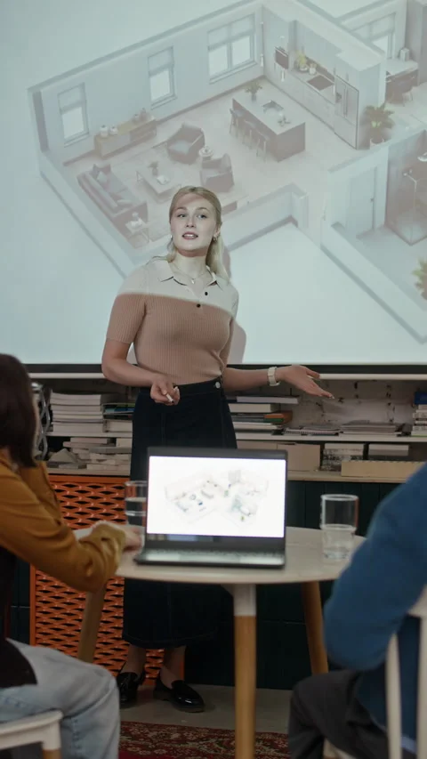 Woman Architect Presenting 3D Digital Building Plan during Office Meeting Stock Footage 327850312
