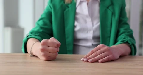 Woman in argument with partner forcefully punching fist on table Stock Footage 264749929
