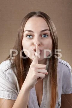 Woman asking for silence Stock Photos