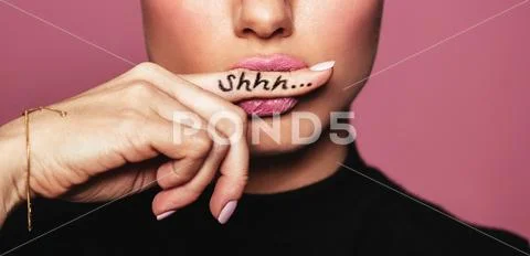 Woman asking for silence Stock Photos