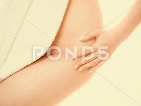 Woman ass vagin belly hide by towel. Stock Photos