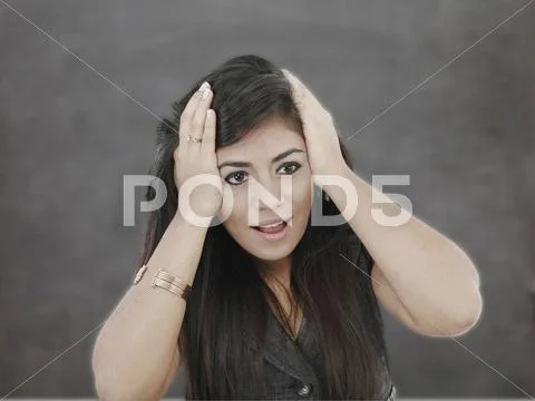 Woman with astonished expression Stock Photos
