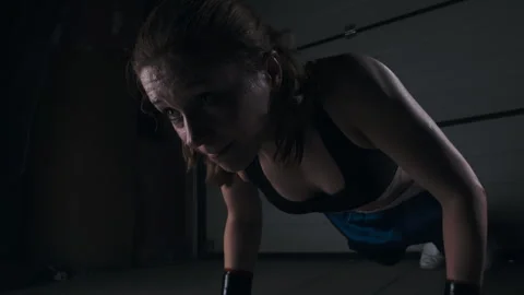 Woman athlete does push-up workouts.  .   動画素材 274430280