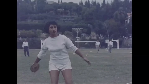 Woman athlete performs disc throw game - 1958 Stock Footage 103601285