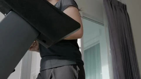 Woman athletic doing exercise on the treadmill with smartwatch on her hand. Stock Footage 155345424