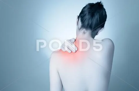 Woman with back pain Stock Photos