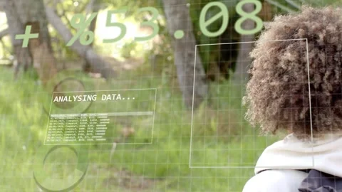 Woman with backpack pausing and turning away in park as HUD data updating for Stock Footage 334013713