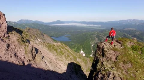Woman with backpack on peak Video stock 54153722