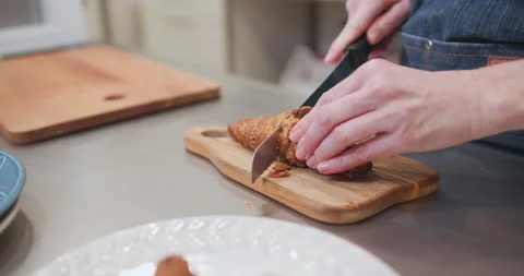 Woman baker preparing raw dough for pastry on baking manufacture Stock Footage 237909072
