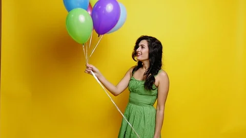 Woman with ballons at studio Stock Footage 81752858