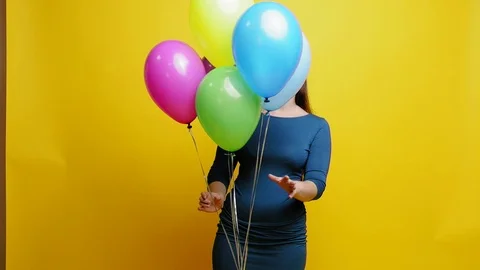 Woman with ballons at studio Stock-Footage 82067940