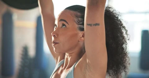 Woman, barbell press and exercise in gym for workout, functional training and Video stock 249160271