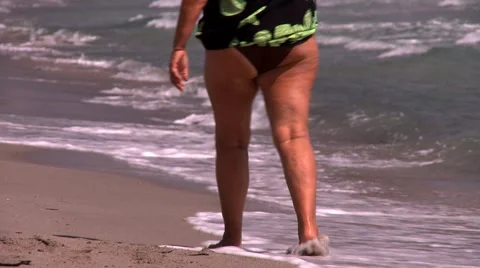 Woman on beach Stock Footage 5505901
