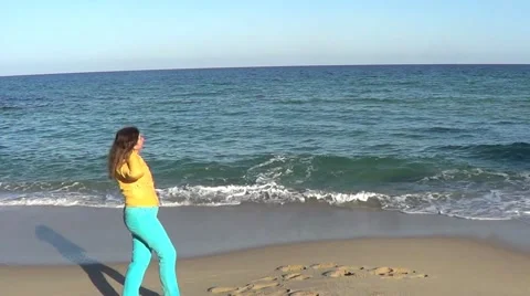 Woman on beach 스톡 동영상 61830871