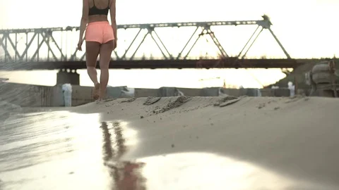 Woman on the beach -  is going Stock Footage 129104847