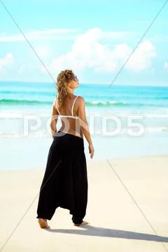 Woman on the beach Stock Photos