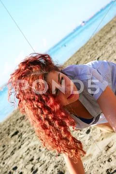 Woman on beach Stock Photos