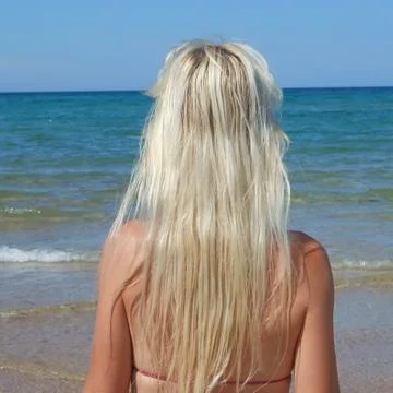 Woman at beach Stock Photos