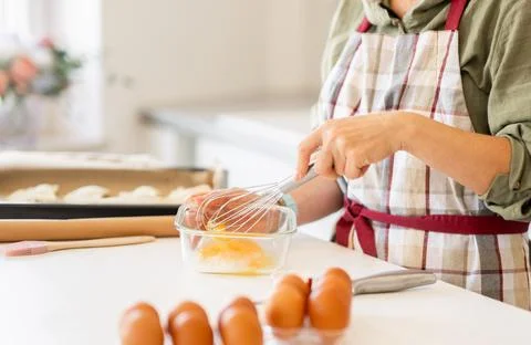 Woman Beating Egg For Baking Stock Photos