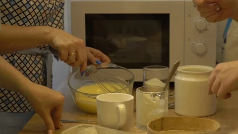 The Woman Beating Eggs Stock Footage 104484726