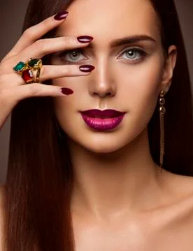 Woman Beauty Makeup, Nails Lips Eyes, Model Covering Face Make Up by Hand Stock Photos