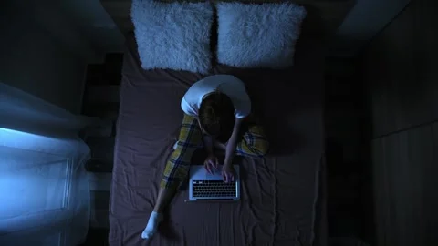 Woman in bed using laptop. Stock Footage 147104222